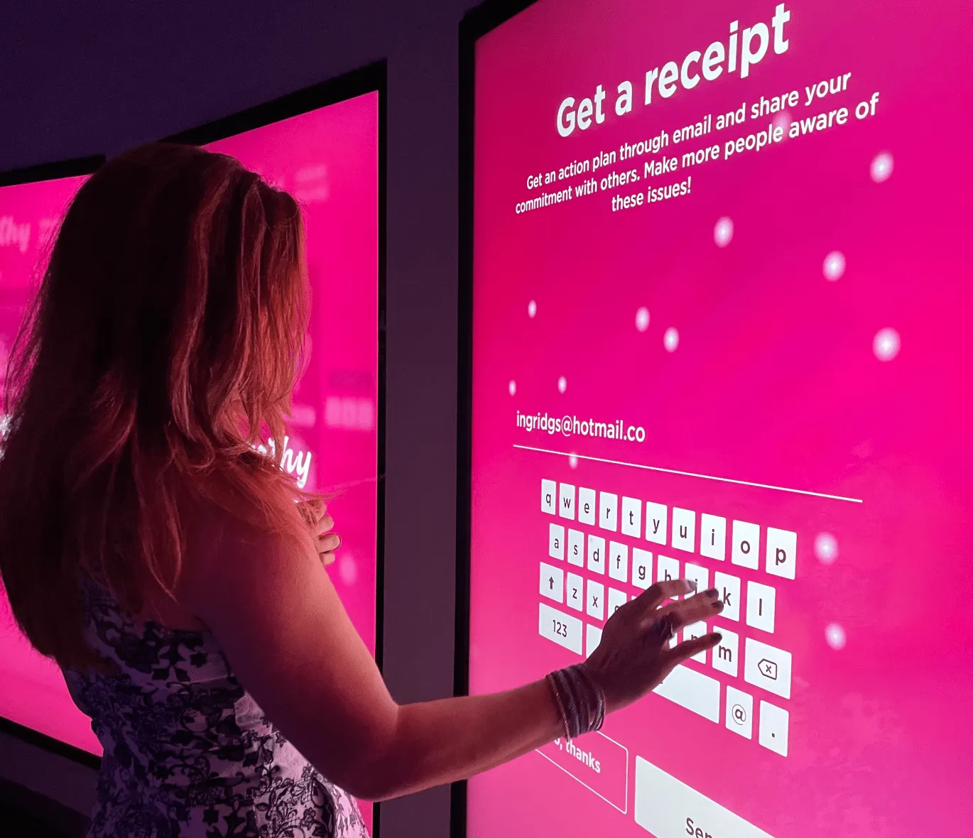A visitor interacting with the empathy vending machine.