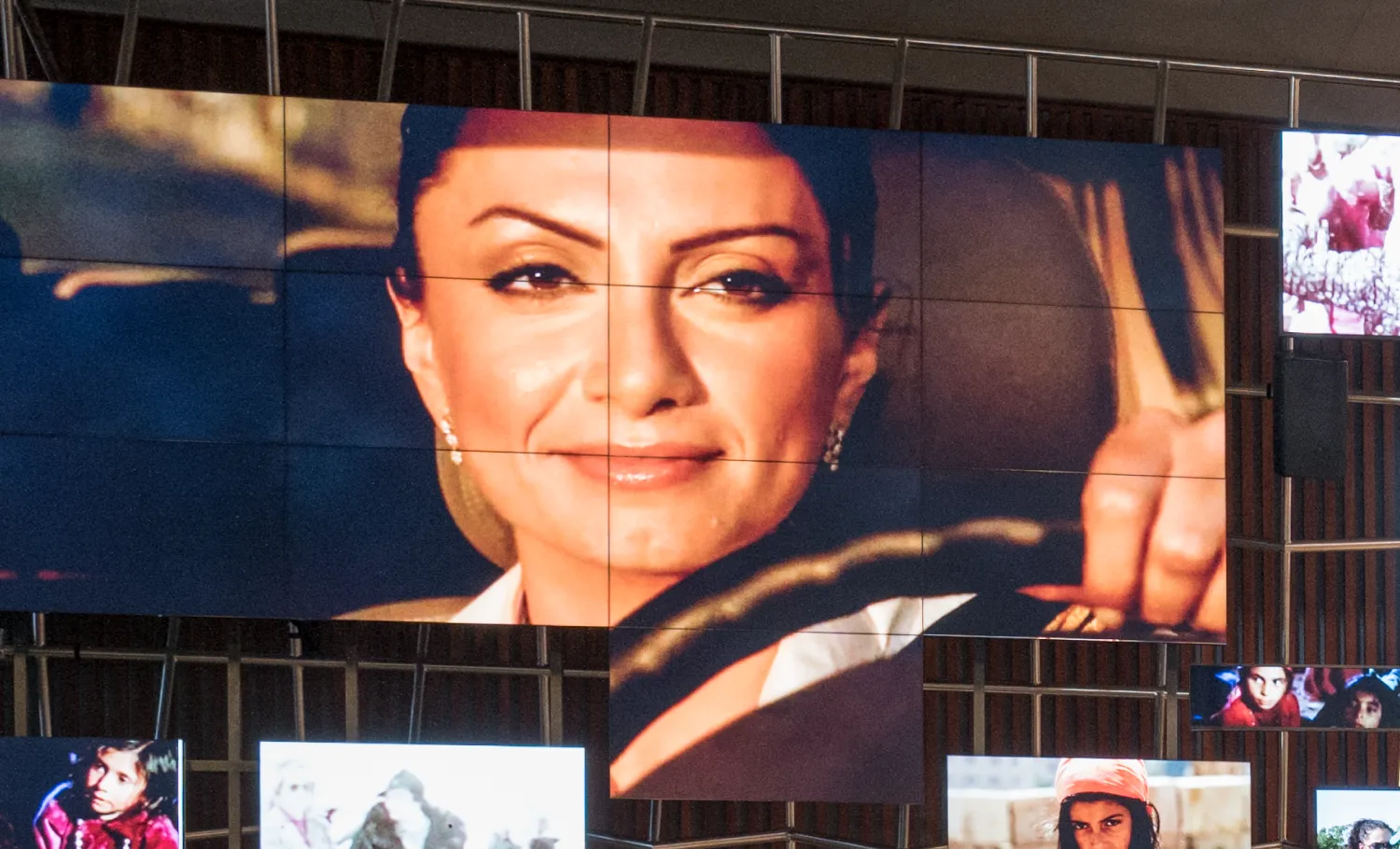 Several screens are combined together to create large-scale visuals of famous movie scenes.