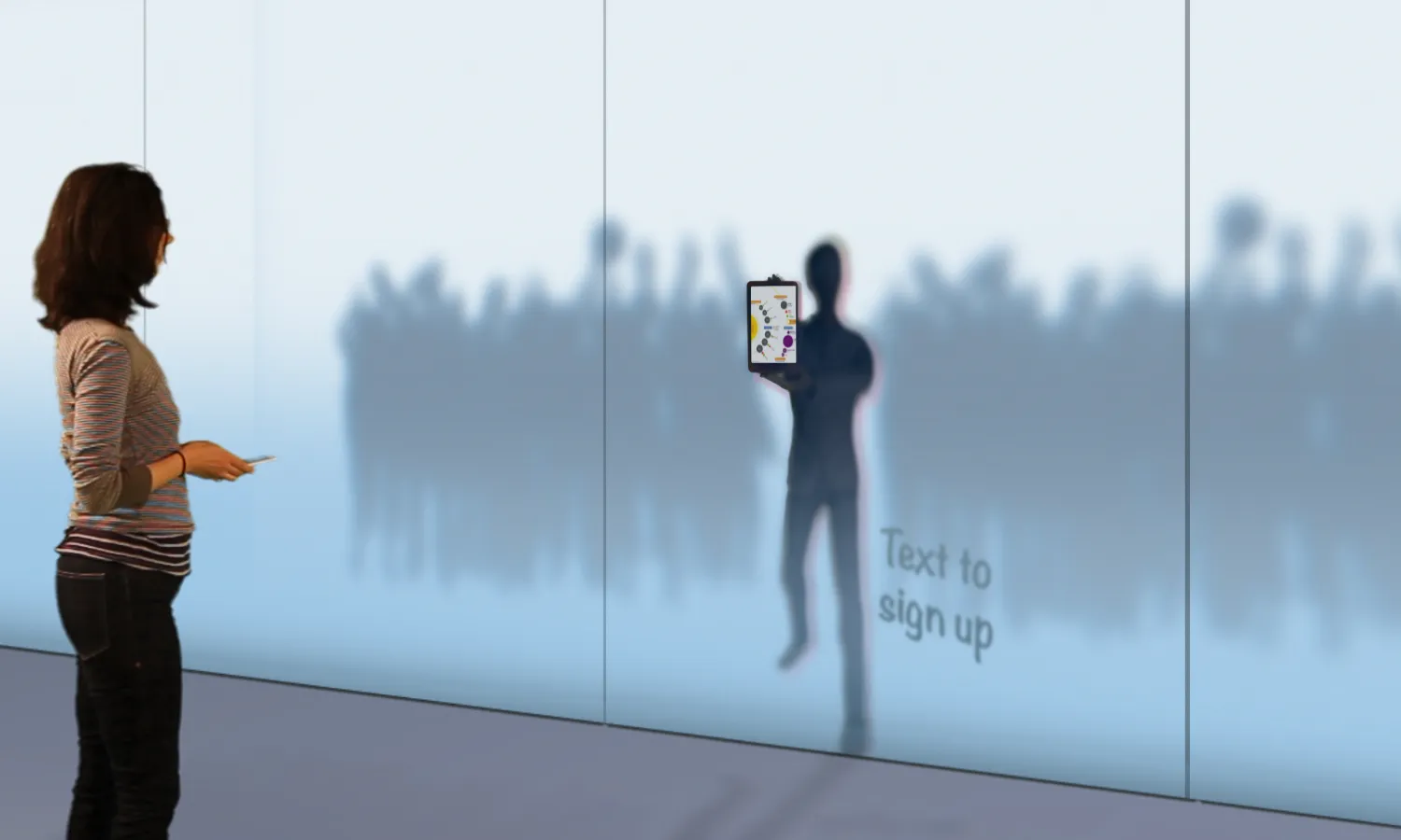 Female visitor looking at the media shown by an AI on the Hidden Narratives digital immersive wall.