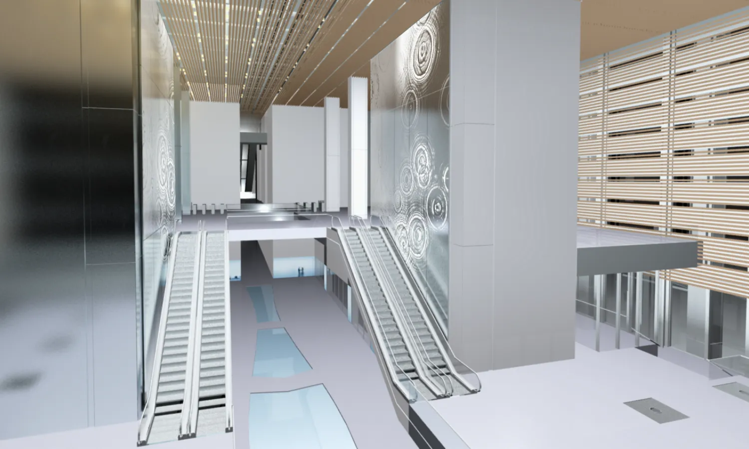 Large empty building lobby with a digital screen wall stretching across 2 floors.
