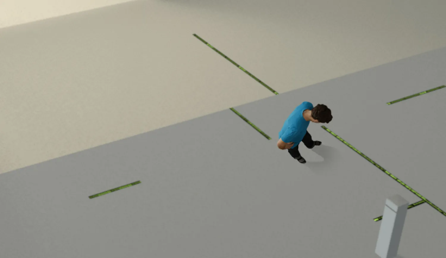 Top view of a man standing in a building lobby.