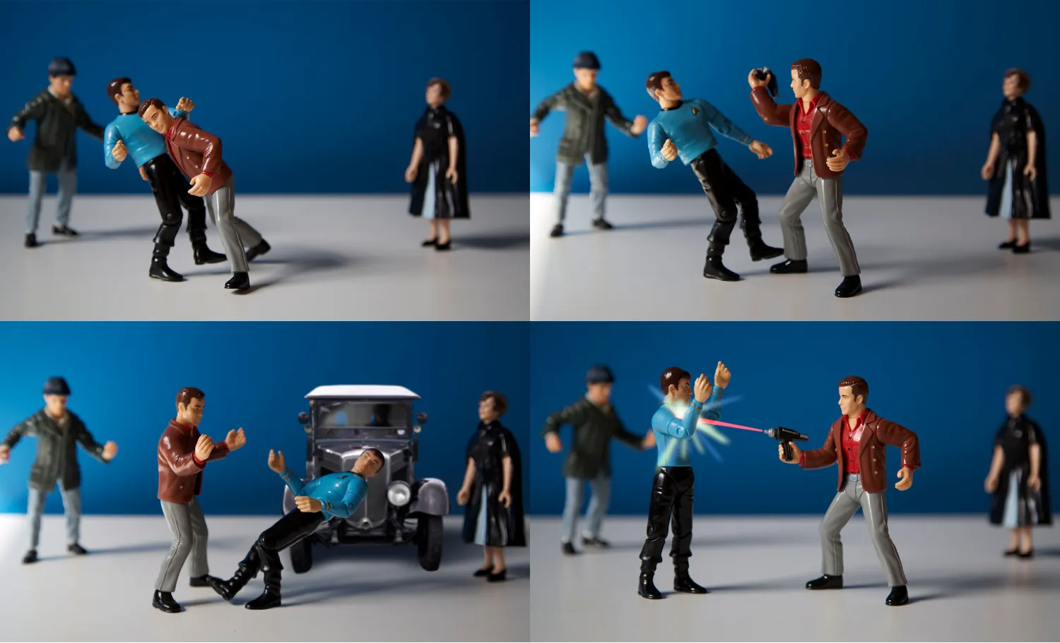 Plastic figurines of famous characters combatting in a comic book-style panel.