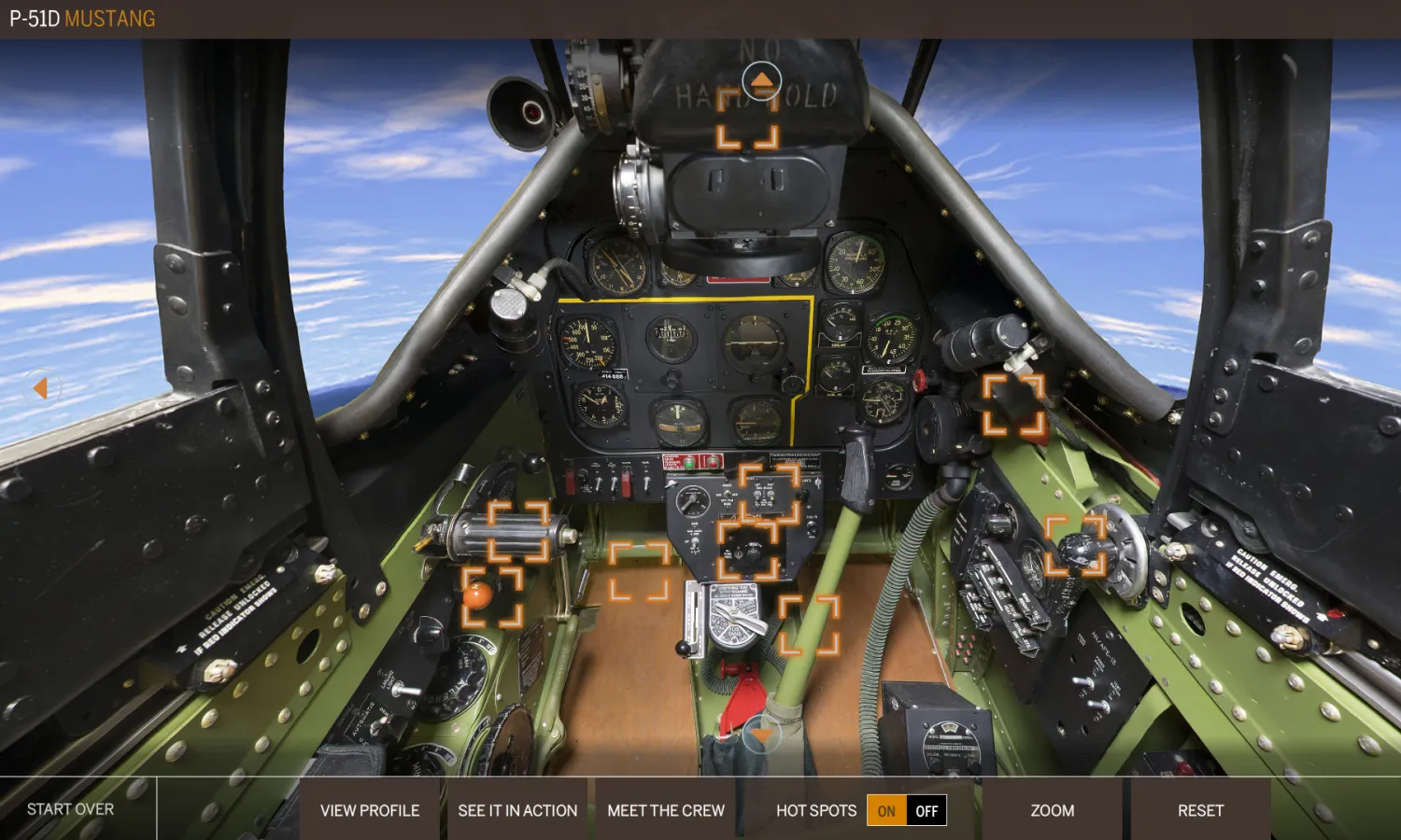 The mock cockpit of a P-51D Mustang plane housing the flight simulator.