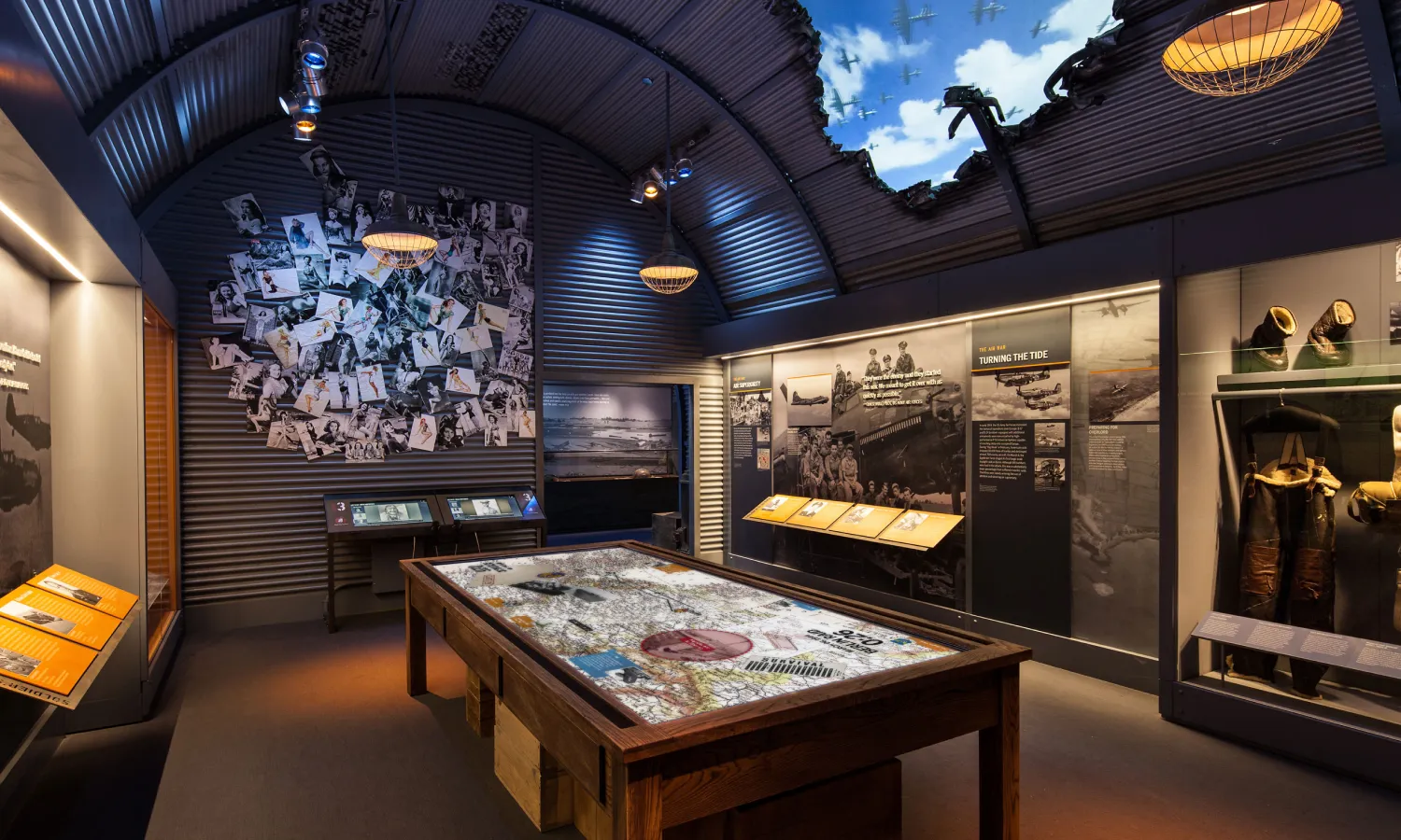 Interior of an exhibition space showcasing historical artifacts from WWII.
